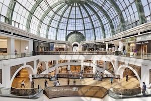 Dubai Mall luxury shopping, elegant woman holding vape accessory, FUMMO King Beco Soft comparison, fashion statement - How Dubai Is Defying the Luxury Downturn | BoF