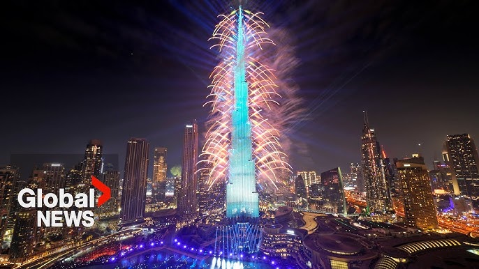 Burj Khalifa New Year fireworks, person enjoying vape peacefully, stress-free holiday in Dubai - New Years 2024: Dubai puts on dazzling fireworks show from iconic Burj Khalifa