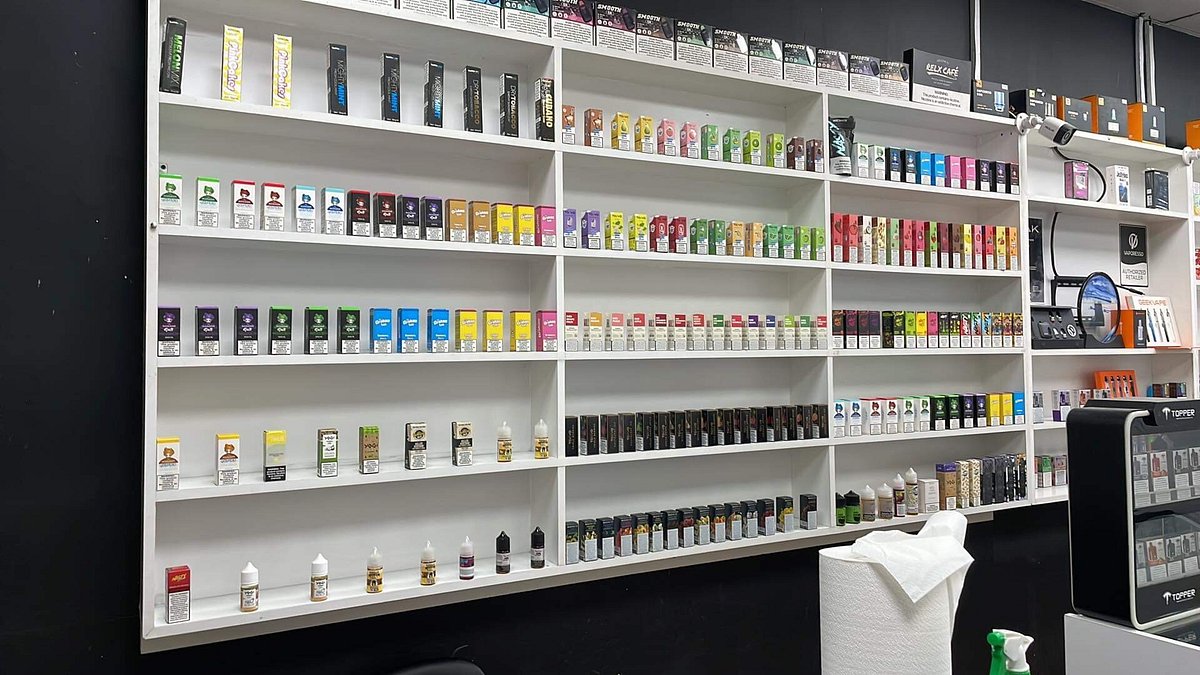 Person confused vape shop Dubai Mall, customer overwhelmed by vape selection, shopping for first vape Dubai - Vape N Chill Uae (Dubai, United Arab Emirates): Hours, Address ...